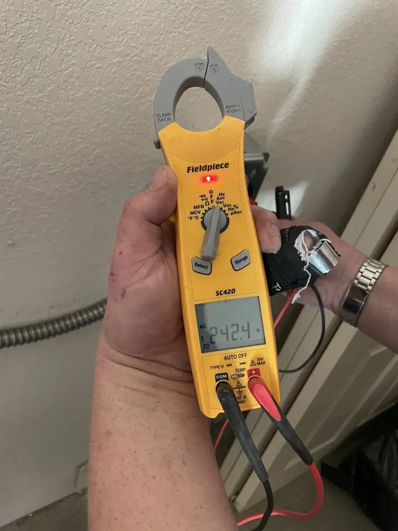 Voltage testing with clamp meter during Generator Installation in Lakeshore